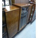 A WALNUTWOOD DISPLAY CABINET, HAVING STEPPED TOP