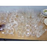 TEN CUT GLASS STEM WINES, IN TWO SIZES (6+4) AND A SET OF TWELVE CUT GLASS BRANDY BALLOONS AND SIX