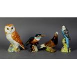FOUR BESWICK POTTERY MODELS OF BIRDS, comprising: BARN OWL (1046), PIGEON (1383), BLUE BUDGIE (1216)