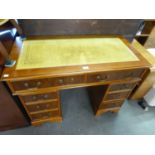 GEORGIAN STYLE MAHOGANY AND YEW-WOOD VENEERED DOUBLE PEDESTAL DESK, WITH TOOLED LEATHER INSET TOP,