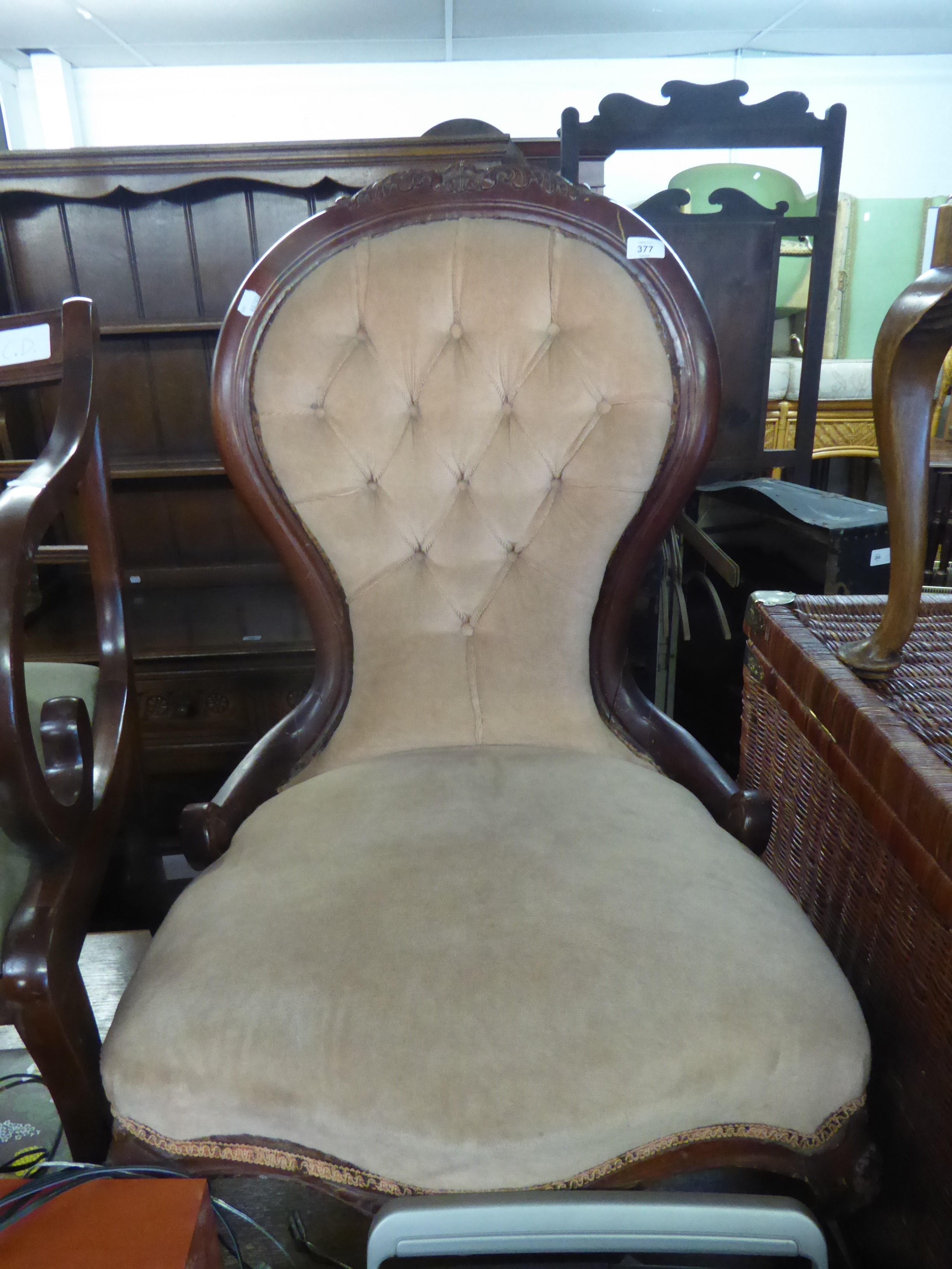 VICTORIAN MAHOGANY SHOW WOOD FRAMED BALLOON BACKED NURSING CHAIR, BUTTON UPHOLSTERED BACK AND THE