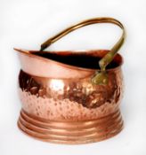 PLANISHED COPPER COAL BUCKET WITH BRASS HANDLE, AND A COPPER HUNTING HORN WITH BRASS MOUTH PIECE,