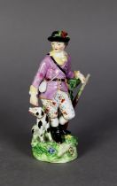 NINETEENTH CENTURY DERBY PORCELAIN FIGURE OF A HUNTSMAN, painted in colours and gilt and modelled