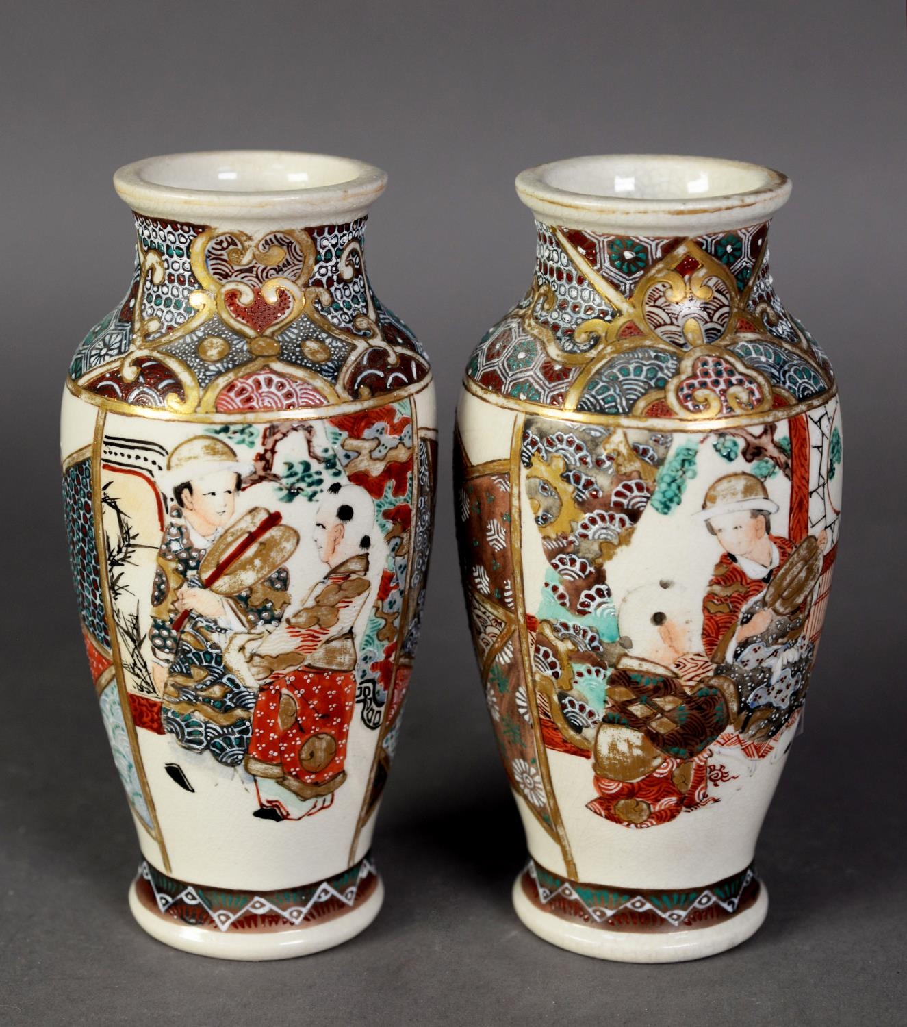 PAIR OF EARLY TWENTIETH CENTURY JAPANESE PORCELAIN WALL PLAQUES, decorated in polychrome enamels