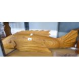 A LIFE-SIZED CARVED WOOD MODEL OF A LARGE KOI CARP, APPROXIMATELY 2’10” LONG
