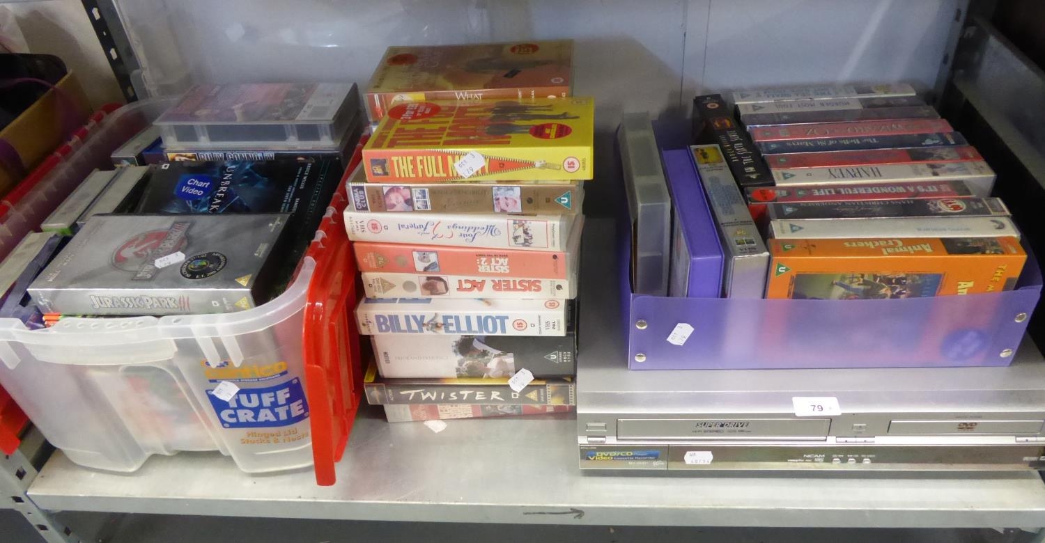 A PANASONIC VIDEO AND DVD PLAYER AND A QUANTITY OF VIDEO CASSETTES