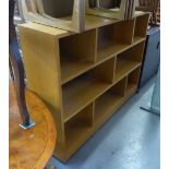 A WOOD EIGHT SECTION, THREE TIER OPEN BOOKCASE