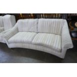 LAURA ASHLEY CURVED SOFA,  EACH WITH LOW BACK WITH ARMS SLOPING FROM THE TOP, FOUR LOOSE CUSHIONS,