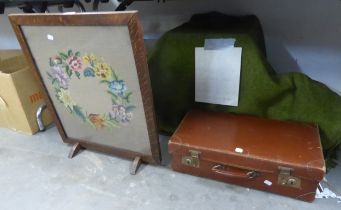 A LEATHER SUITCASE AND AN OAK FLORAL TAPESTRY FIRE- SCREEN (2)