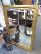 A RECTANGULAR GILT FRAMED BEVELLED EDGE WALL MIRROR (84cm x 60cm)