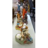 FIVE AFRICAN FIGURES AND TWO HAND PAINTED GRANDAD AND GRANDMA POTTERY FIGURES (7)