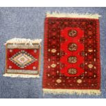 TURKOMAN BOKHARA SMALL RUG OR MAT with a single row of four guls on a crimson field, multi-stripes