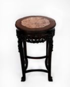 LATE NINETEENTH/ EARLY TWENTIETH CENTURY CARVED HARDWOOD URN STAND WITH PINK VEINED MARBLE TOP,