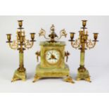 CIRCA 1900 FRENCH GREEN ONYX AND GILT METAL MOUNTED CLOCK GARNITURE, THE JAPY FRERES BELL STRIKING