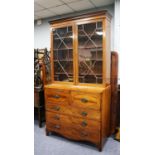 GEORGE III MAHOGANY AND SATINWOOD CROSSBANDED SECRETAIRE BOOKCASE, he moulded cornice above a pair