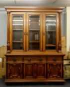 NINETEENTH CENTURY OAK AND POLLARD OAK LIBRARY BOOKCASE, the moulded cornice above three bevel