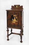 EARLY TWENTIETH CENTURY OAK AND CHINOISERIE LACQUERED BEDSIDE CABINET, the moulded oblong top with