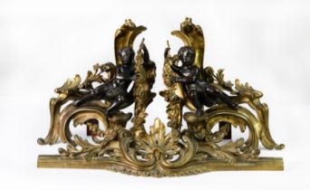 PAIR OF NINETEENTH CENTURY FRENCH LOUIS XV STYLE CAST AND GILT COPPER ALLOY CHENET FORM HEARTH