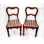 SET OF SIX VICTORIAN MAHOGANY BUCKLE BACK SINGLE DINING CHAIRS, each of typical form with waisted