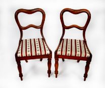 SET OF SIX VICTORIAN MAHOGANY BUCKLE BACK SINGLE DINING CHAIRS, each of typical form with waisted