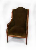 EDWARDIAN LINE INLAID MAHOGANY SEMI WINGED EAST ARMCHAIR, with shaped top rail, downswept arms and