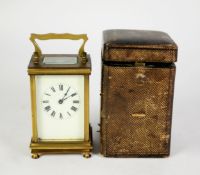 EARLY 1900's FRENCH BRASS CASED CARRIAGE CLOCK with TIMEPIECE movement, the ivory tinted enamelled