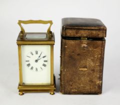 EARLY 1900's FRENCH BRASS CASED CARRIAGE CLOCK with TIMEPIECE movement, the ivory tinted enamelled