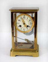 CIRCA 1900 FRENCH BRASS CASED FOUR GLASS MANTEL CLOCK, the movement stamped JAPY FRERES, striking on