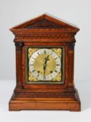 LATE 19TH CENTURY OAK CASED WINTERHALDER AND HOFMEISTER ARCHITECTURAL BRACKET CLOCK, the Roman