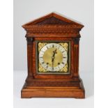 LATE 19TH CENTURY OAK CASED WINTERHALDER AND HOFMEISTER ARCHITECTURAL BRACKET CLOCK, the Roman