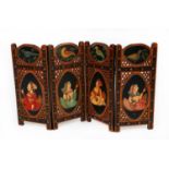 PRE-WAR INDIAN PIERCED AND PAINTED DOUBLE-SIDED WOOD FOUR FOLD LOW SCREEN OR TABLE SCREEN, each side