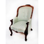 VICTORIAN CARVED ROSEWOOD EASY ARMCHAIR, the moulded show wood frame with floral cresting to the