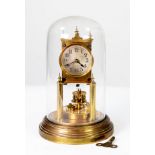 19TH CENTURY GUSTAV BECKER BRASS ANNIVERSARY CLOCK, with silvered arabic numeral dial, presented