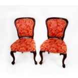 SET OF FIVE LATE NINETEENTH CARVED MAHOGANY DINING CHAIRS, each with paterae and bell flowers to the