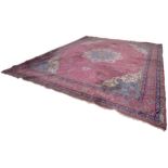 SEMI-ANTIQUE KERMANSHAH LARGE PERSIAN CARPET with pale blue and ivory petal shaped centre