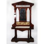 LATE VICTORIAN MAHOGANY AND WHITE VEINED MARBLE HALL STAND, the architectural cornice above a eleven