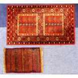 BELGIUM ROYAL KASHAN POWER LOOM WOVEN ALL-WOOL RUG, in Turkoman style with two rectangular panels,