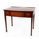 NINETEENTH CENTURY LINE INLAID MAHOGANY BOW FRONTED DRESSING OR WRITING TABLE, the shaped top with