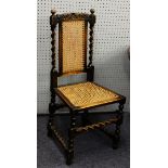 SET OF SIX CAROLEAN STYLE CARVED DARK OAK STAINED FRUITWOOD SINGLE DINING CHAIRS WITH CANED SEATS