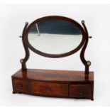EARLY NINETEENTH CENTURY LINE INLAID AND FIGURED MAHOGANY TOILET MIRROR, the oval plate in a