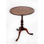 GEORGIAN LINE INLAID MAHOGANY TILT TOP OCCASIONAL TABLE, the circular dished top with carved cyma