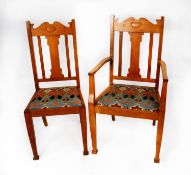 SET OF EIGHT EARLY TWENTIETH CENTURY ARTS AND CRAFTS LIGHT OAK DINING CHAIRS, INCLUDING FOUR