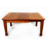 EARLY TWENTIETH CENTURY ARTS AND CRAFTS LIGHT OAK WIND-OUT EXTENDING DINING TABLE WITH ADDITIONAL