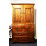 NINETEENTH CENTURY LINE INLAID OAK AND ROSEWOOD CROSSBANDED LINEN PRESS, the moulded cornice above a