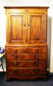 NINETEENTH CENTURY LINE INLAID OAK AND ROSEWOOD CROSSBANDED LINEN PRESS, the moulded cornice above a