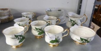 LUBERN ENGLISH BONE CHINA TEA SERVICE FOR SIX PERSONS, 21 PIECES WITH PRINTED FLORAL SPRAYS AND 22ct