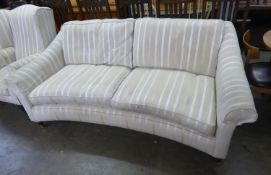 LAURA ASHLEY CURVED SOFA,  EACH WITH LOW BACK WITH ARMS SLOPING FROM THE TOP, FOUR LOOSE CUSHIONS,