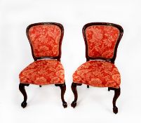 SET OF FIVE LATE NINETEENTH CARVED MAHOGANY DINING CHAIRS, each with paterae and bell flowers to the