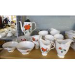 ROYAL ALBERT CHINA ‘TAHITI’ RED ROSE DECORATED TEA AND COFFEE SERVICE, 36 PIECES IN ALL