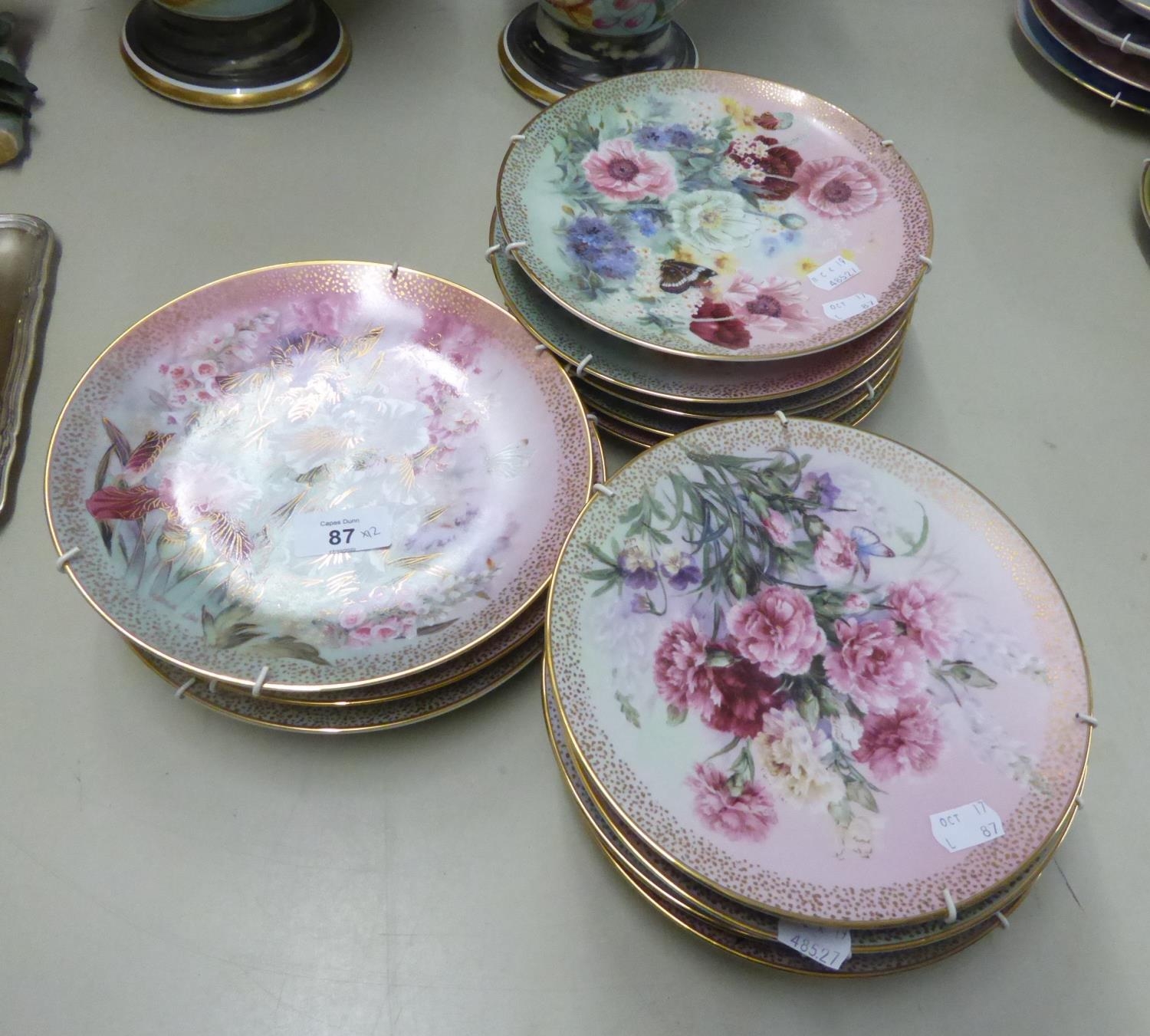 W. S. GEORGE CHINA SET OF TWELVE COLLECTOR’S PLATES, WITH FLORAL BOUQUET DECORATION